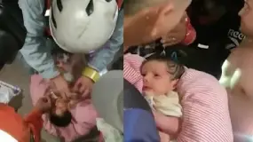 Un bebé de 18 días y su mamá salieron con vida tras 33 horas bajo los escombros en Venezuela